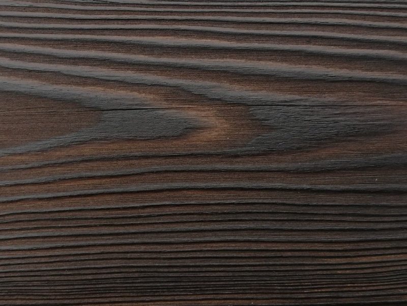 Close up of charred timber cladding - charred level: Dusk