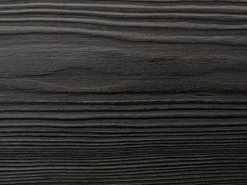 Close up of charred timber cladding - charred level: Raven